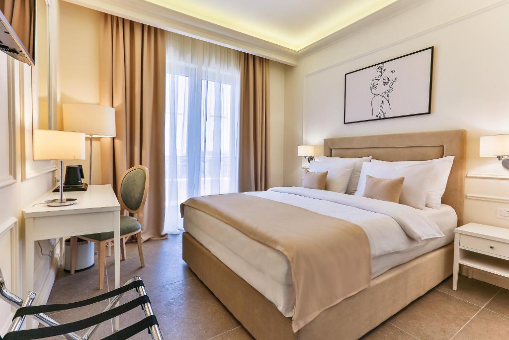Postel nebo postele na pokoji v ubytování Hotel EDEN