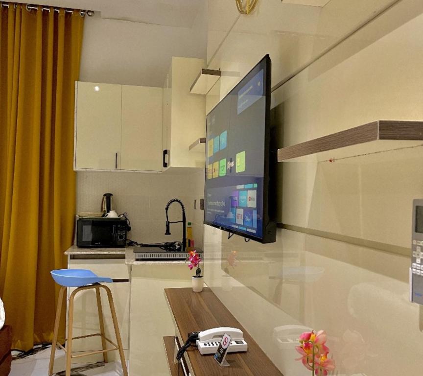 Kuchyň nebo kuchyňský kout v ubytování Lisa Suites Hotel