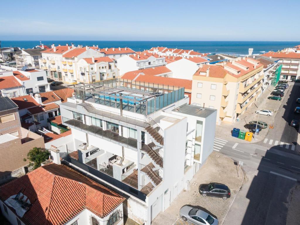 an aerial view of a city with buildings and the ocean at H2O Apartment - Rooftop with pool in Santa Cruz in Santa Cruz