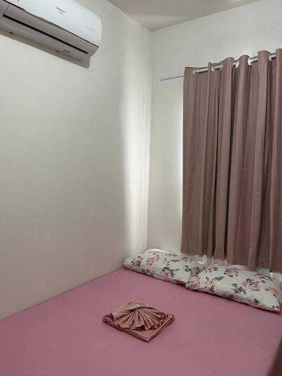 Postel nebo postele na pokoji v ubytování Pousada Irmãos Perrone