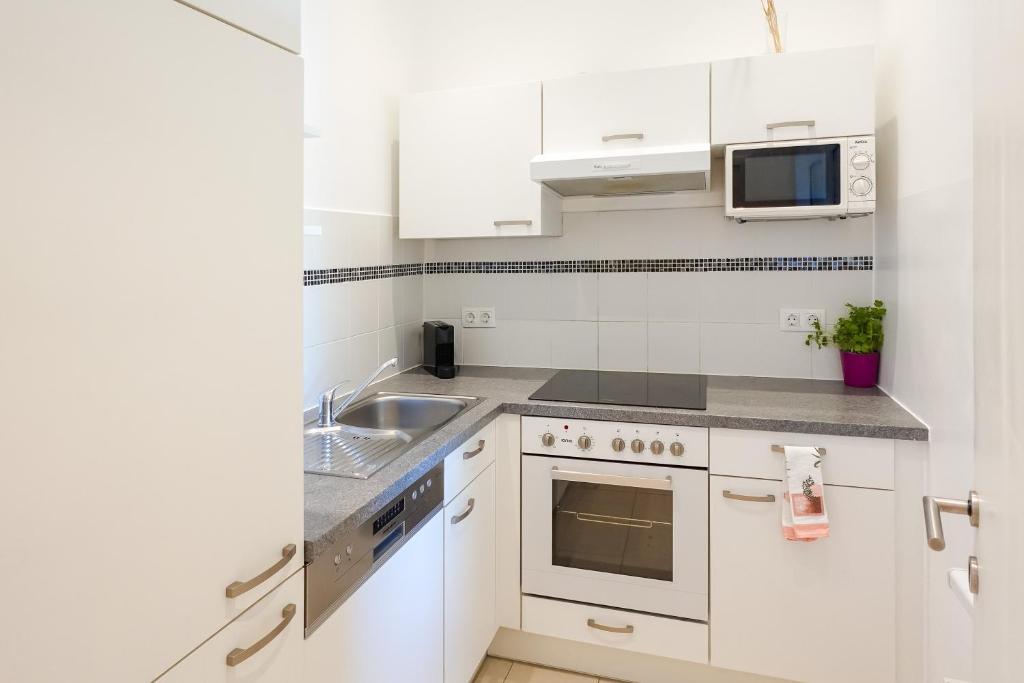 Kuchyňa alebo kuchynka v ubytovaní Appartements CHE