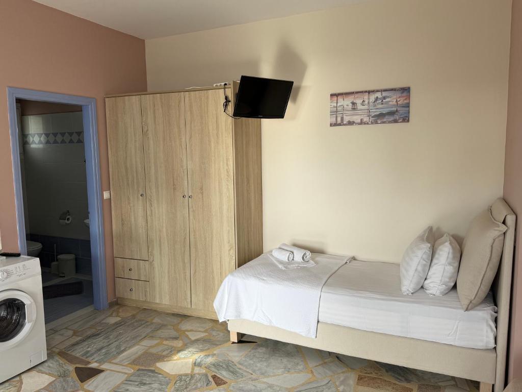 Postel nebo postele na pokoji v ubytování AegeanHeaven