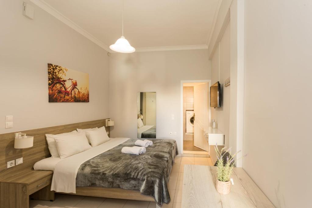 Postel nebo postele na pokoji v ubytování Eleni Apartments