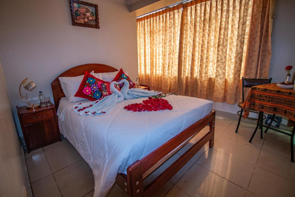 Postel nebo postele na pokoji v ubytování AloInkaHotels