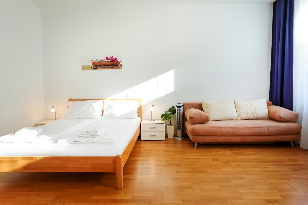 Posteľ alebo postele v izbe v ubytovaní Appartements CHE