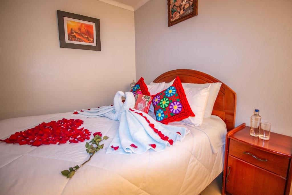 Postel nebo postele na pokoji v ubytování AloInkaHotels