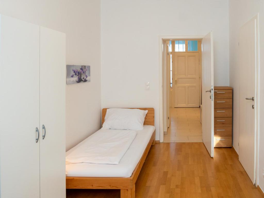 Posteľ alebo postele v izbe v ubytovaní Appartements CHE