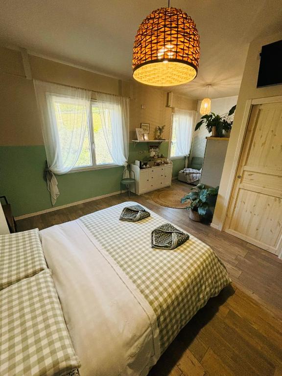 Postel nebo postele na pokoji v ubytování Amagi Home