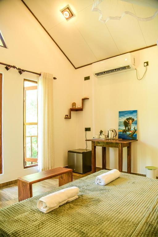Postel nebo postele na pokoji v ubytování EdenHaven Cottage