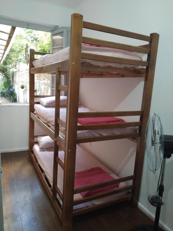Postel nebo postele na pokoji v ubytování Nick Hostel Cidade Baixa- Próx à Redenção, Opinião,Araújo Viana, João Alfredo,