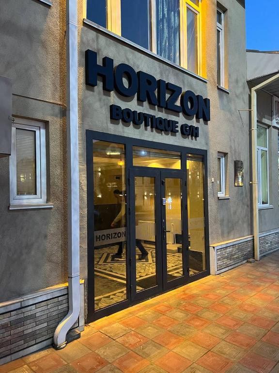 a horizonsizons boutique store with the doors open at Horizon Boutique in Samarkand