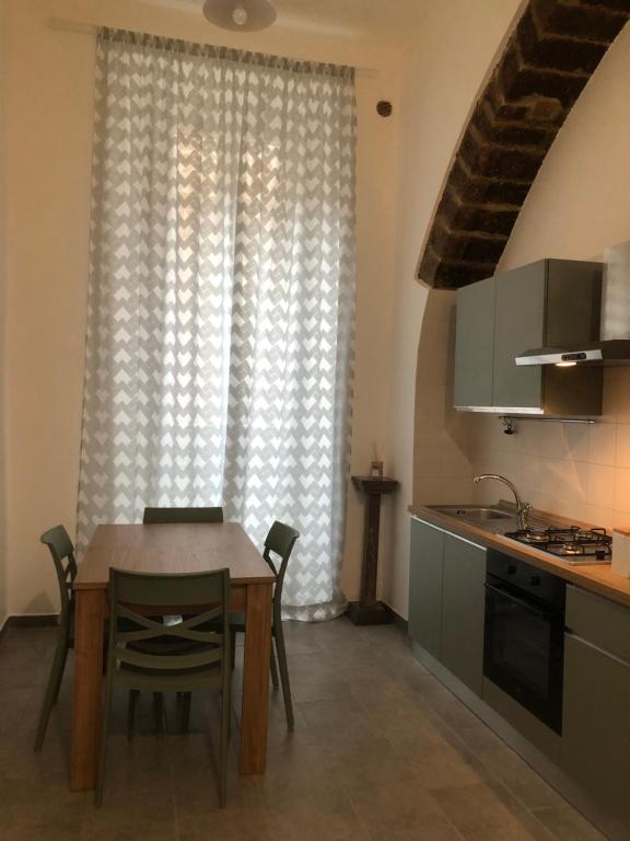 Kuchyň nebo kuchyňský kout v ubytování Casa Gemm