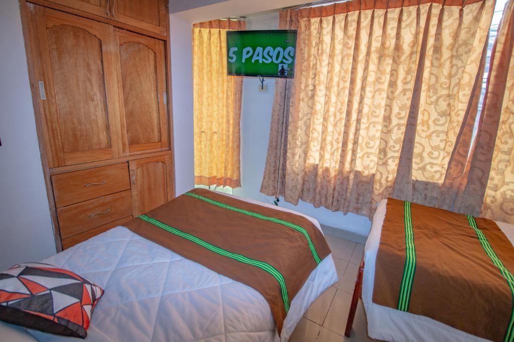 Postel nebo postele na pokoji v ubytování AloInkaHotels