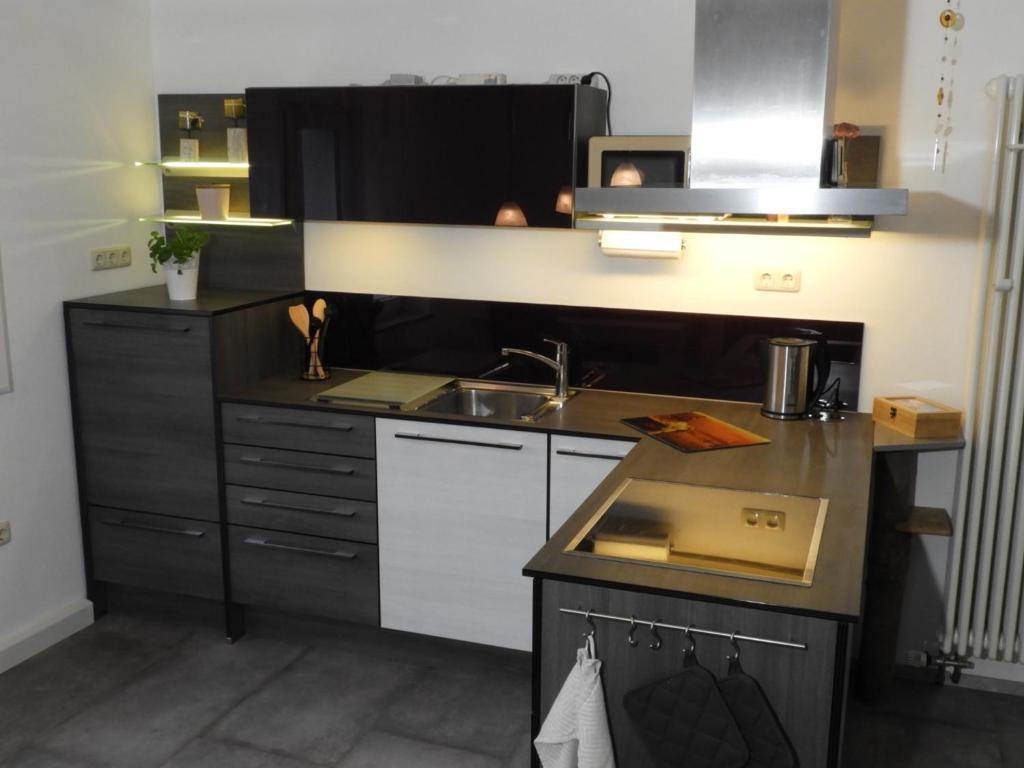 Kuchyň nebo kuchyňský kout v ubytování Apartment Salvete