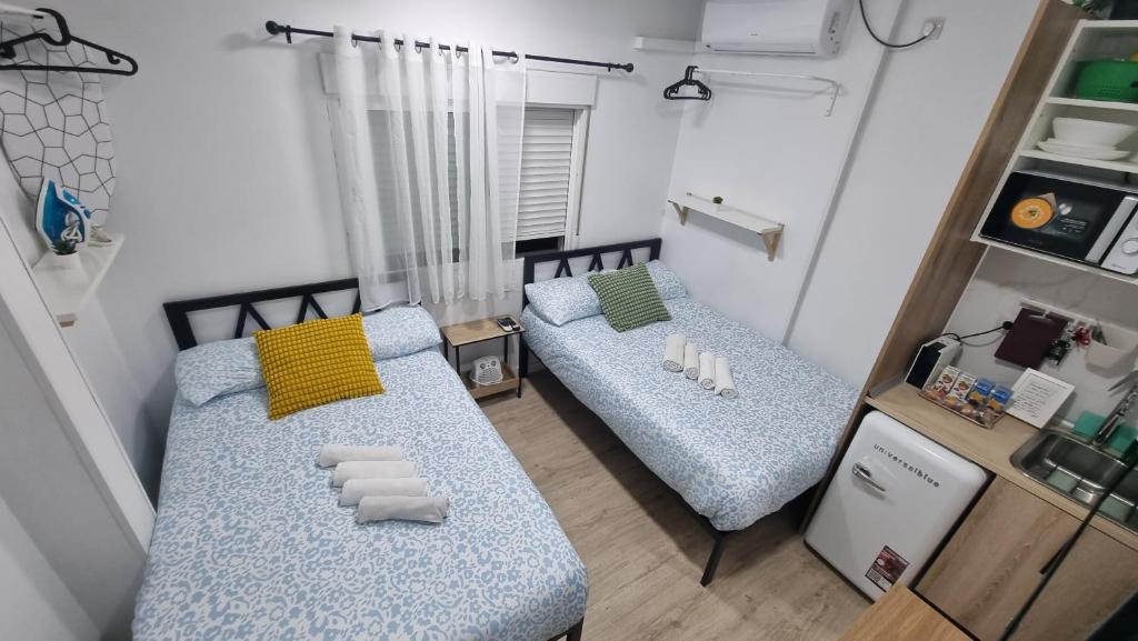 A bed or beds in a room at Mini Estudio Lovely Chueca