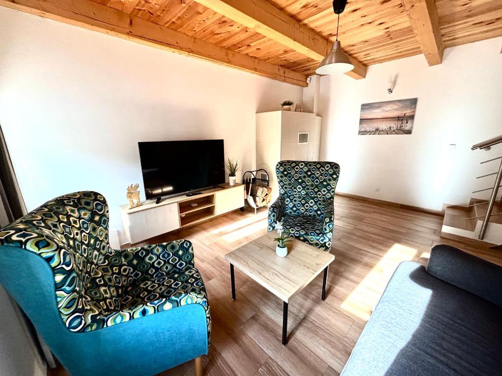 TV a/nebo společenská místnost v ubytování Apartmány Rosenberg