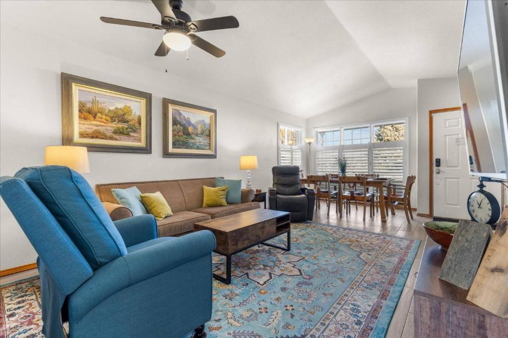 a living room with a couch and a table at Blue Grass Bungalow in Coeur d'Alene