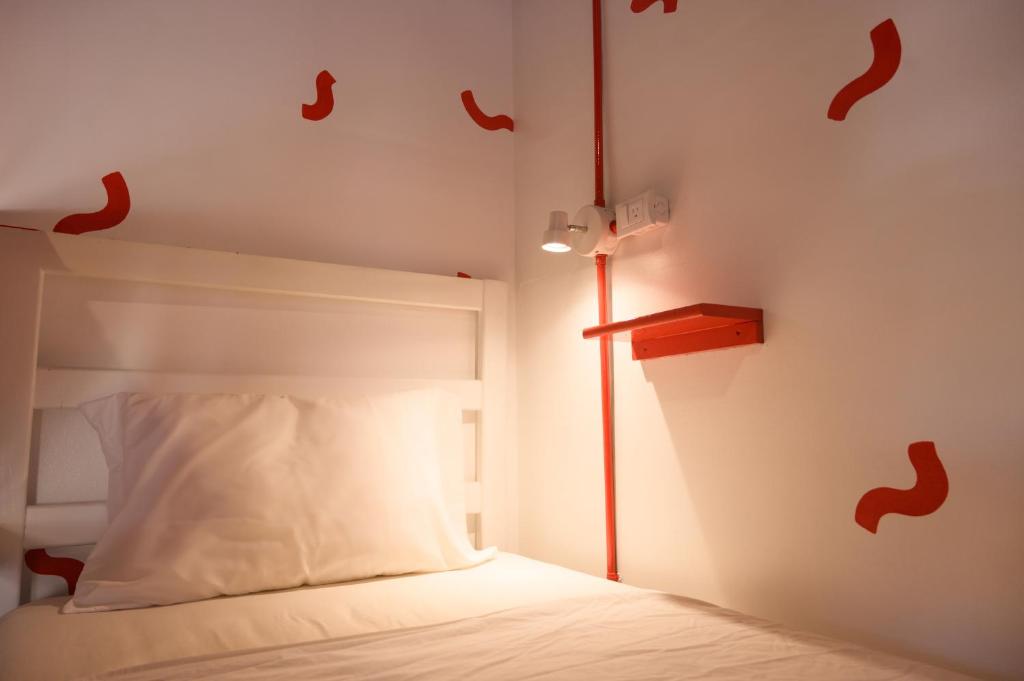 Postel nebo postele na pokoji v ubytování Macarena Hostel