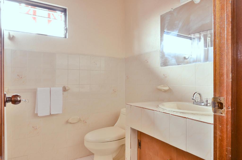 Koupelna v ubytování Macarena Hostel