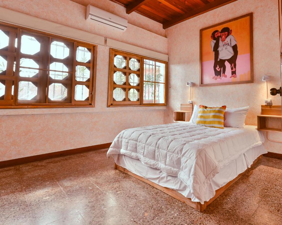 Postel nebo postele na pokoji v ubytování Macarena Hostel