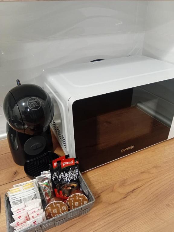 Kuchyň nebo kuchyňský kout v ubytování Apartman SUNSET