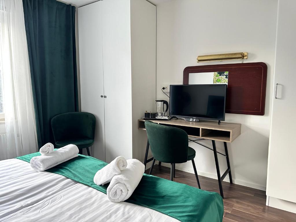Postel nebo postele na pokoji v ubytování Hotell City Karlshamn