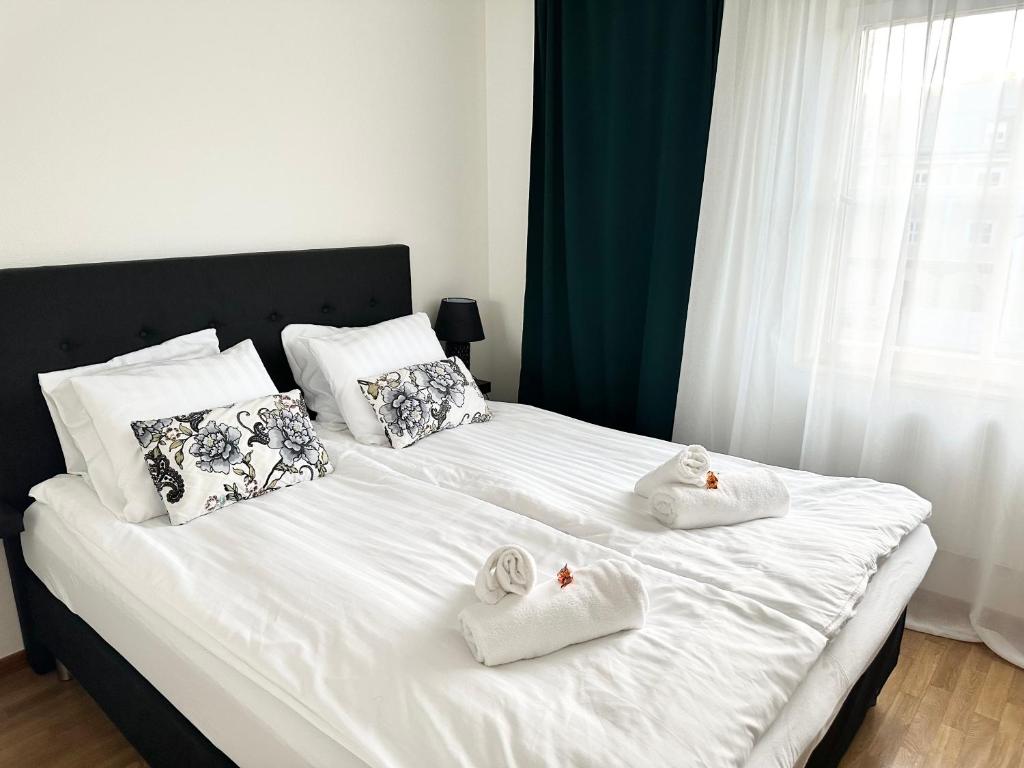 Postel nebo postele na pokoji v ubytování Hotell City Karlshamn