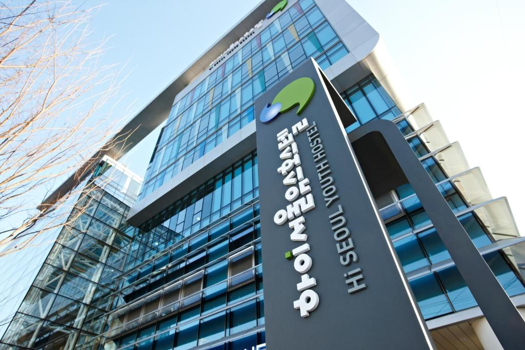 a building with an apple sign in front of it at HiSeoul Youthhostel in Seoul