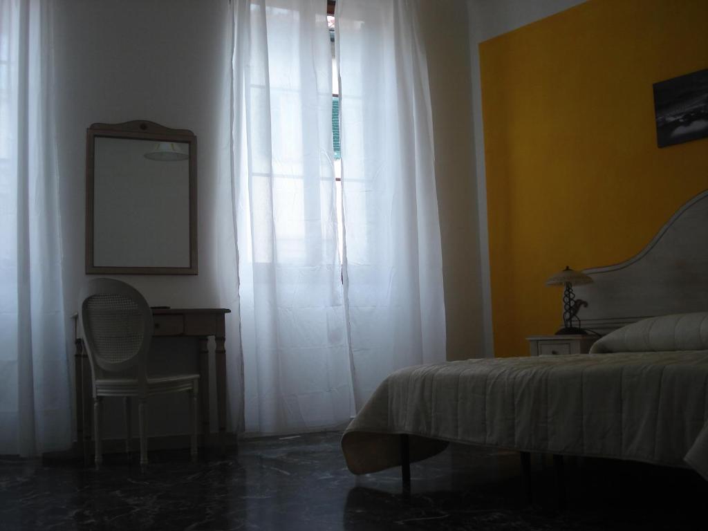 Posteľ alebo postele v izbe v ubytovaní Scala Apartment