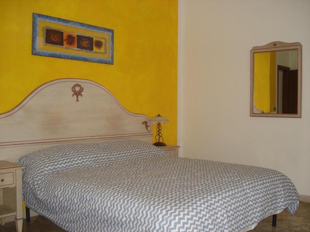 Posteľ alebo postele v izbe v ubytovaní Scala Apartment