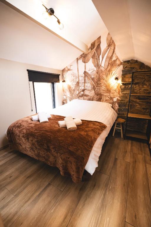 Voodi või voodid majutusasutuse Cosy Wood toas
