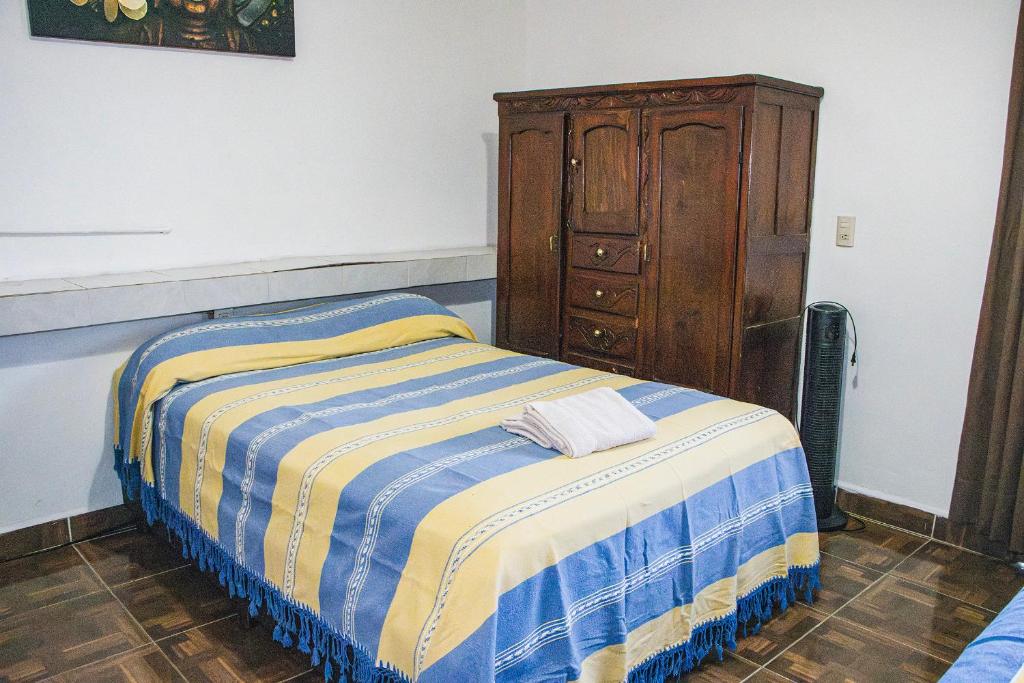 Postel nebo postele na pokoji v ubytování CORAZÓN DE TEPOZ