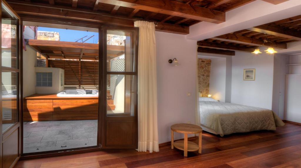 Postel nebo postele na pokoji v ubytování Palazzo Duca