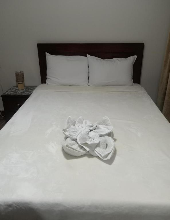 Letto o letti in una camera di Isis Guest House