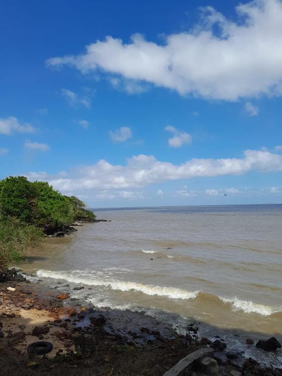 a view of the ocean from the shore of a beach at Paraíso de Deus in Colares
