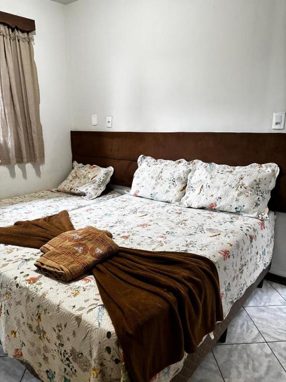 a bedroom with two beds in a room at Centro Histórico Diamantina in Diamantina