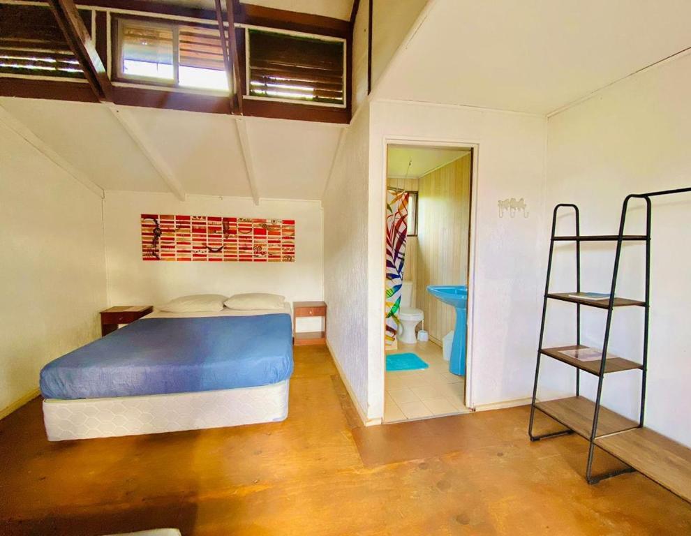 Postel nebo postele na pokoji v ubytování Mata Nui Eco hostel