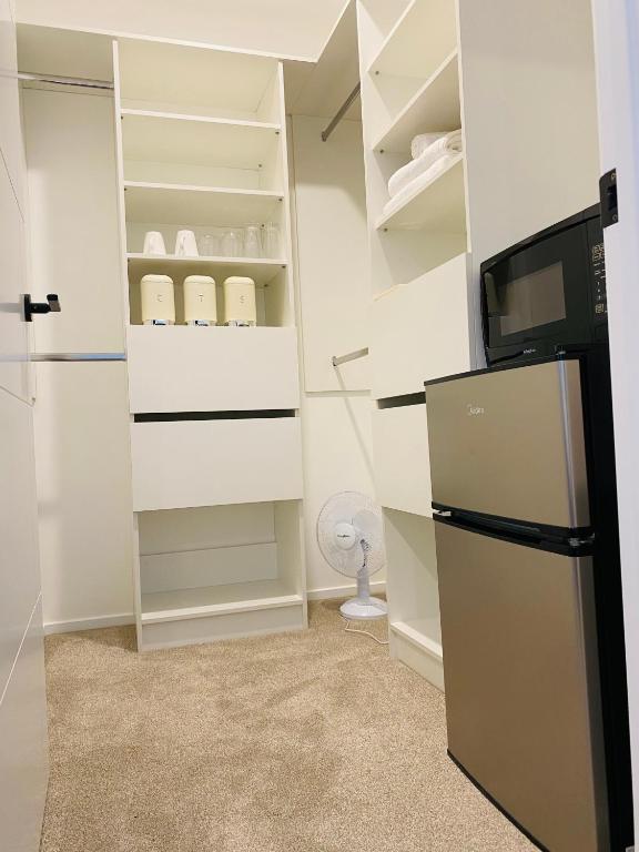 Kuchyň nebo kuchyňský kout v ubytování Ensuite at new property