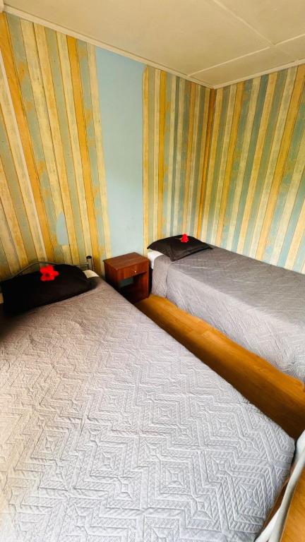 Postel nebo postele na pokoji v ubytování Mata Nui Eco hostel