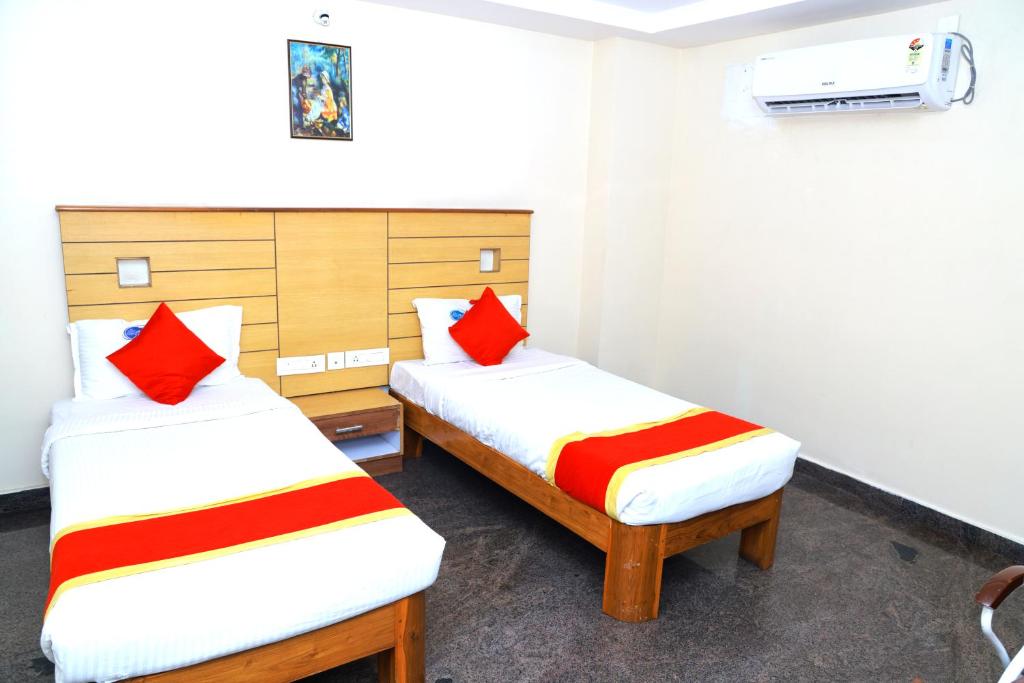 Postel nebo postele na pokoji v ubytování Hotel Way Inn Grand