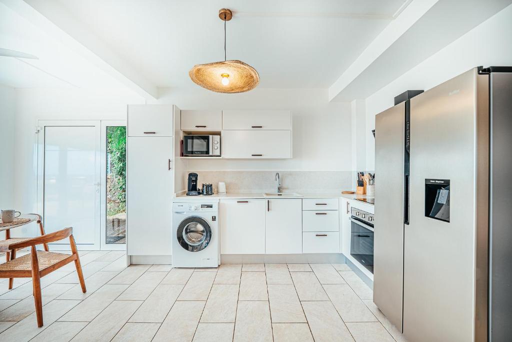 Kuchyň nebo kuchyňský kout v ubytování Appartement T3 -Villa Les Bougainvilliers