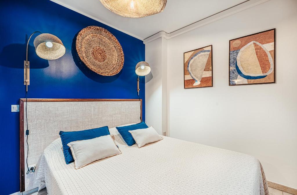 Postel nebo postele na pokoji v ubytování Appartement T3 -Villa Les Bougainvilliers