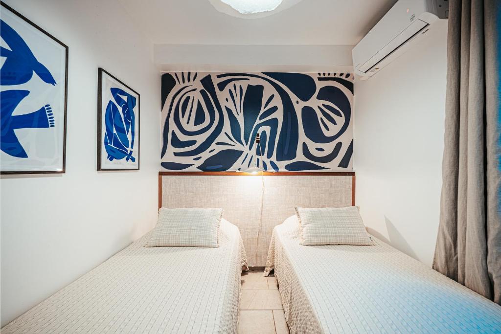 Postel nebo postele na pokoji v ubytování Appartement T3 -Villa Les Bougainvilliers