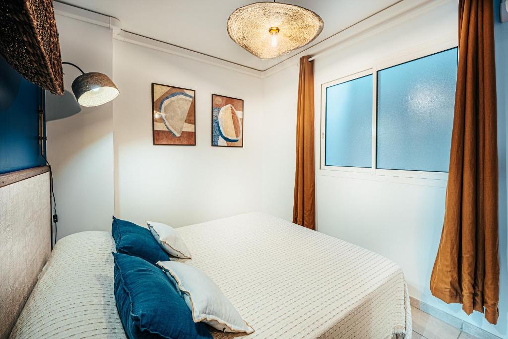 Postel nebo postele na pokoji v ubytování Appartement T3 -Villa Les Bougainvilliers
