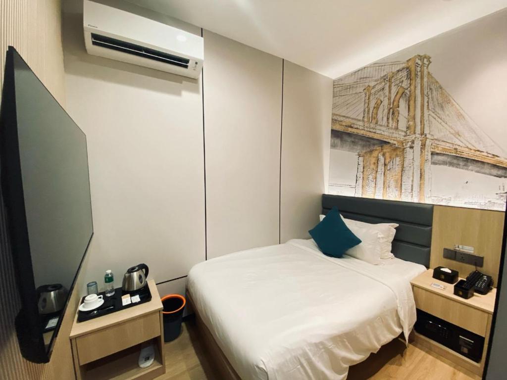 TV a/nebo společenská místnost v ubytování Fan's Hotel Palo