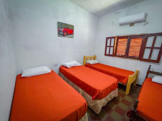 Postel nebo postele na pokoji v ubytování Hospedaje Wasi