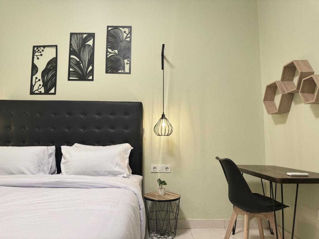 Postel nebo postele na pokoji v ubytování Pause Inn guesthouse