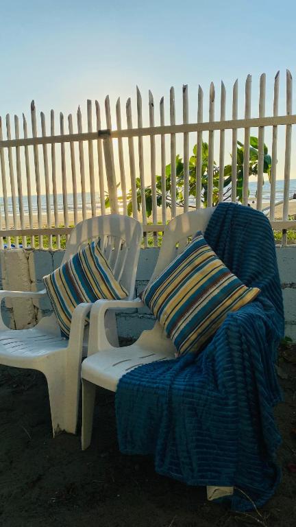Posezení v ubytování Tierra Bella-Exclusive Beachfront Villa at Elyu