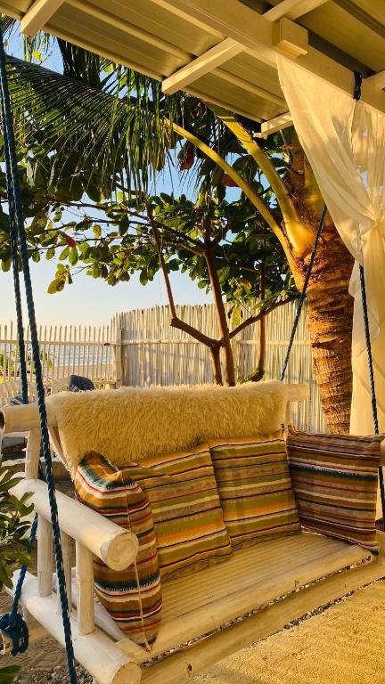 Posezení v ubytování Tierra Bella-Exclusive Beachfront Villa at Elyu