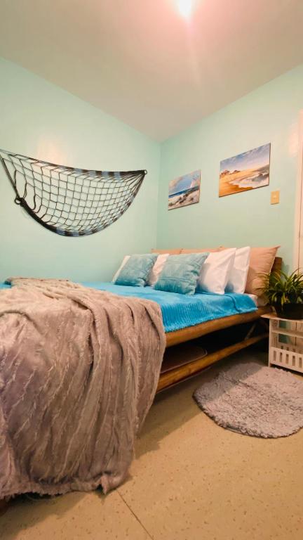 Postel nebo postele na pokoji v ubytování Tierra Bella-Exclusive Beachfront Villa at Elyu